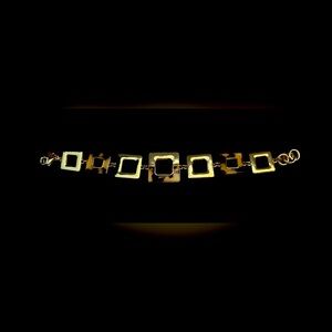 Dana Bachman chain bracelet in gold tone and animal print squares